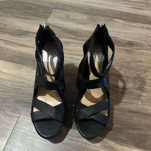 Black strappy wedge heels